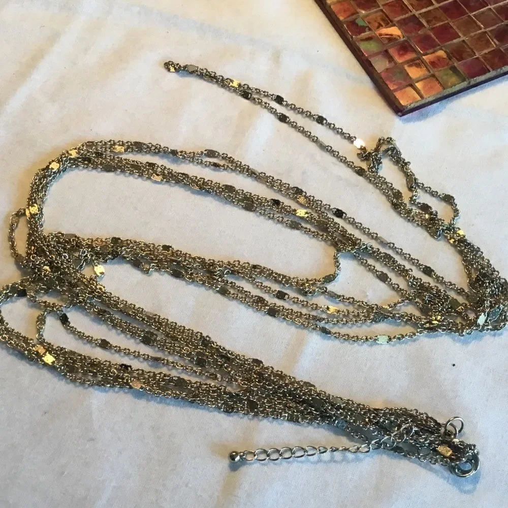 $12 or 3/$25. 5 Strand Goldtone Necklace